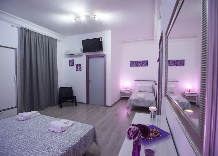 Del Centro E فندق مبيت وإفطار بارتينيكو