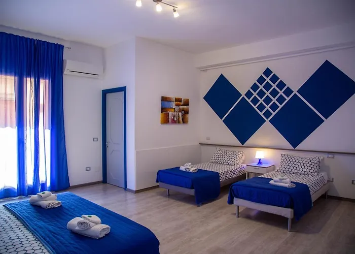 Del Centro E فندق مبيت وإفطار بارتينيكو